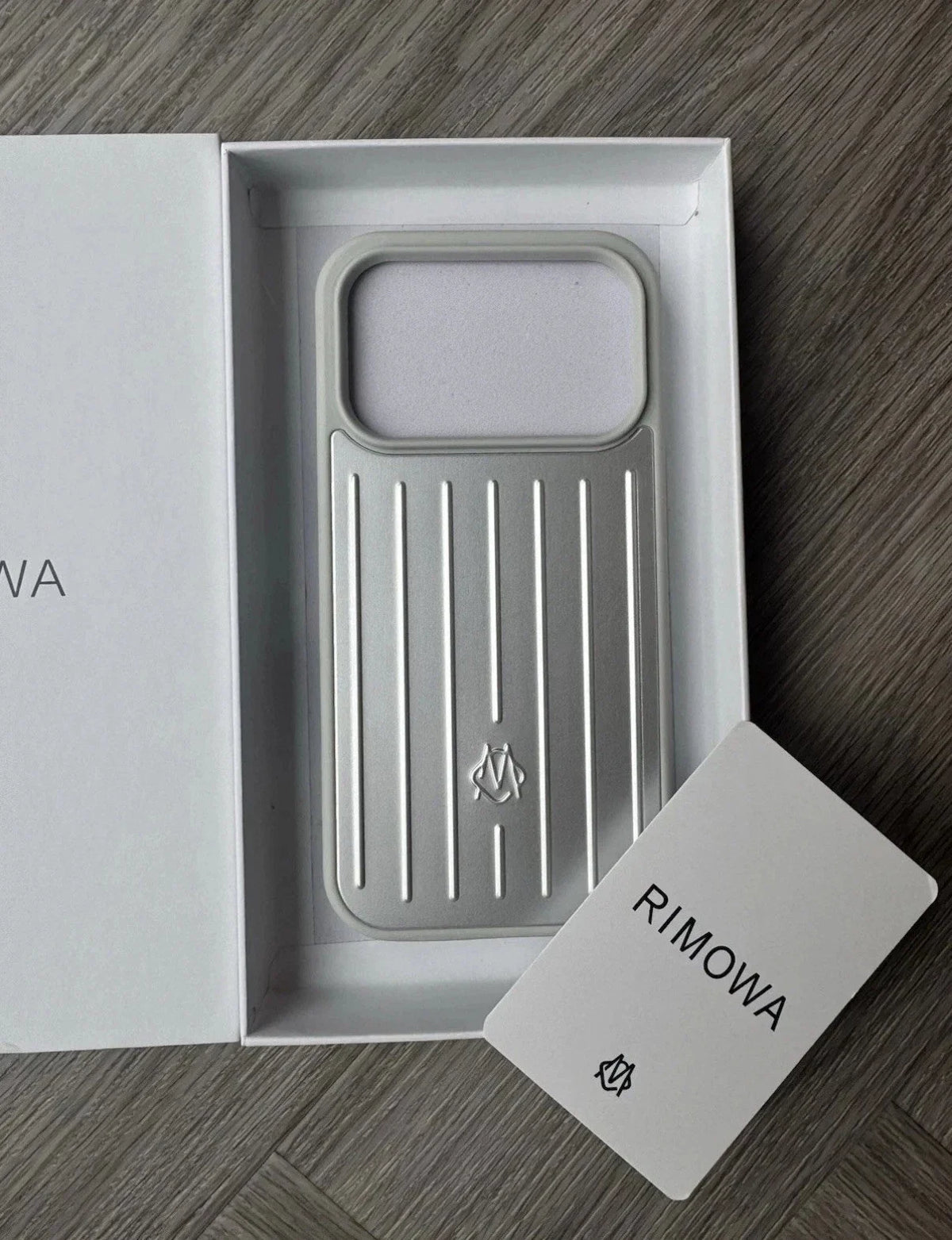 RIMOWA Case for iPhone 17 Pro Max – Silver Aluminum Protective Cover
